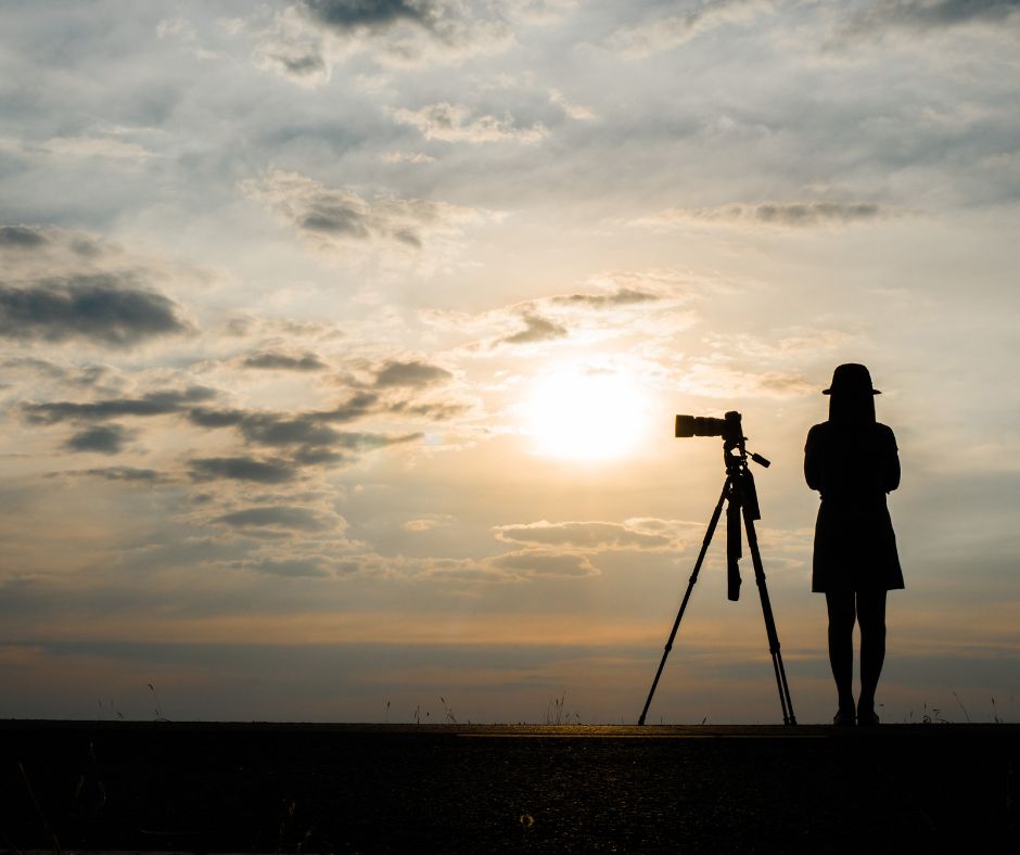 A girl with a standing camera