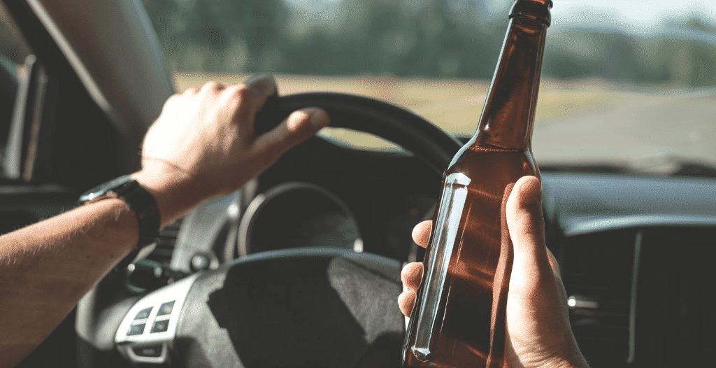 A man drinking bear while driving a car - DUI Charge case