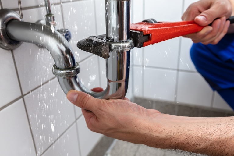 A Man is Repairing Water Null