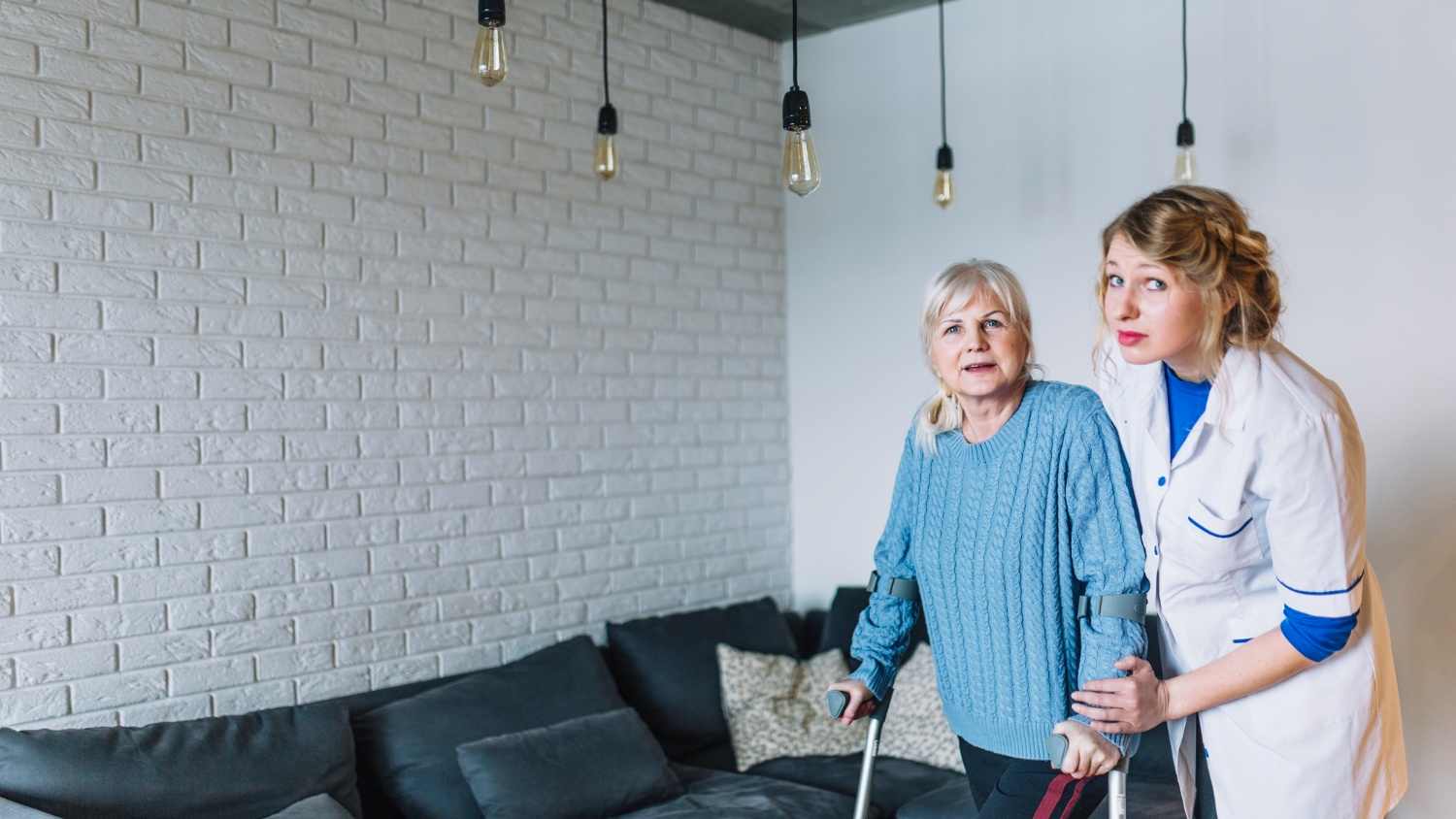 A nurse taking care of an old women in a nursing home