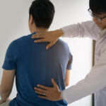 Chiropractor with Male Client