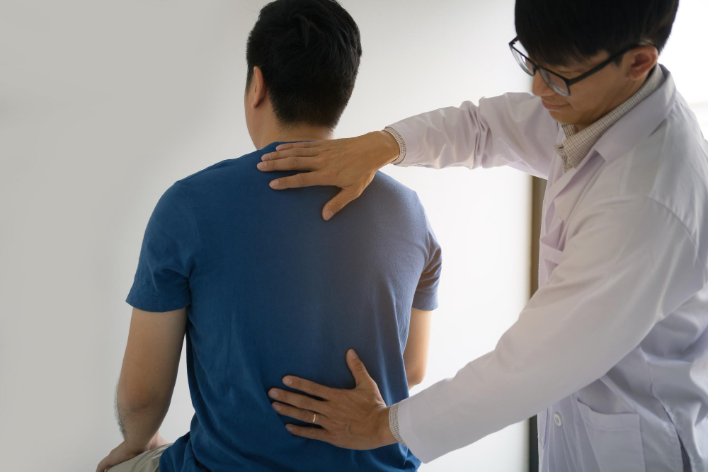 Chiropractor with Male Client