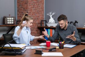 Small business owner reviewing financial statements with a bookkeeper