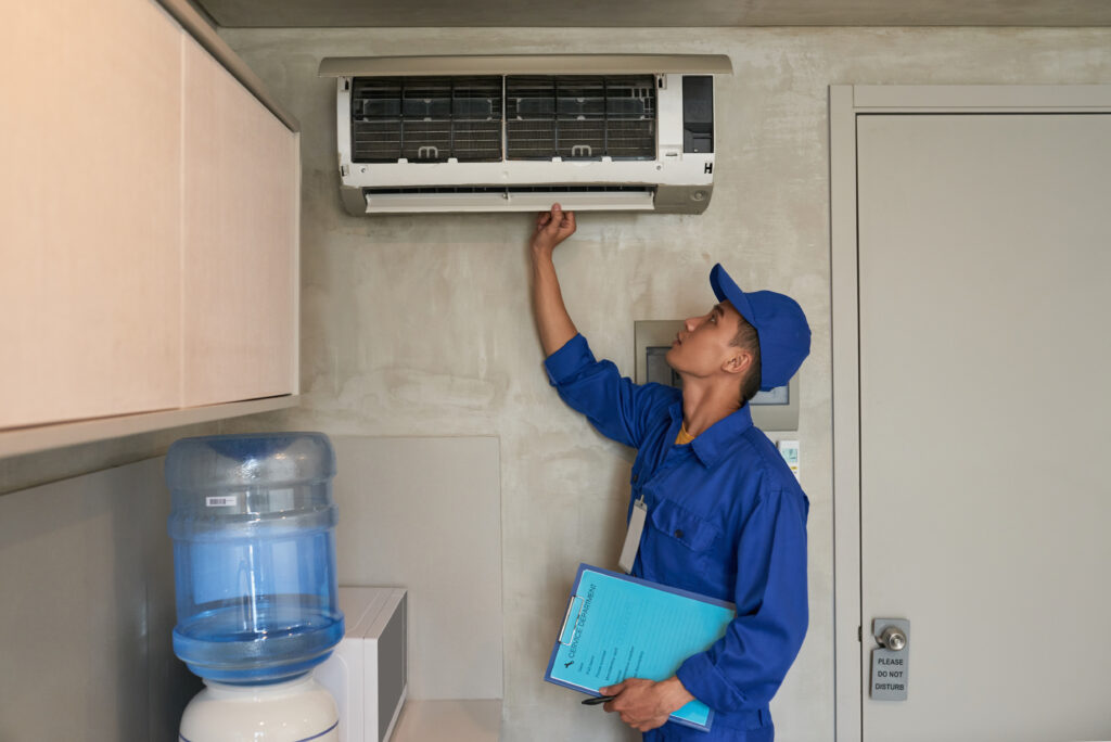 checking-conditioner-1-1024x684 Professional Air Conditioning Installation in Clifton, NJ – Get a Free Quote