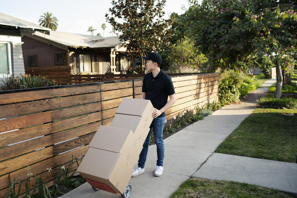 delivery-person-getting-parcel-out-delivery-2-1024x683 Best Long Distance Moving Northbrook Chicago Can Count On