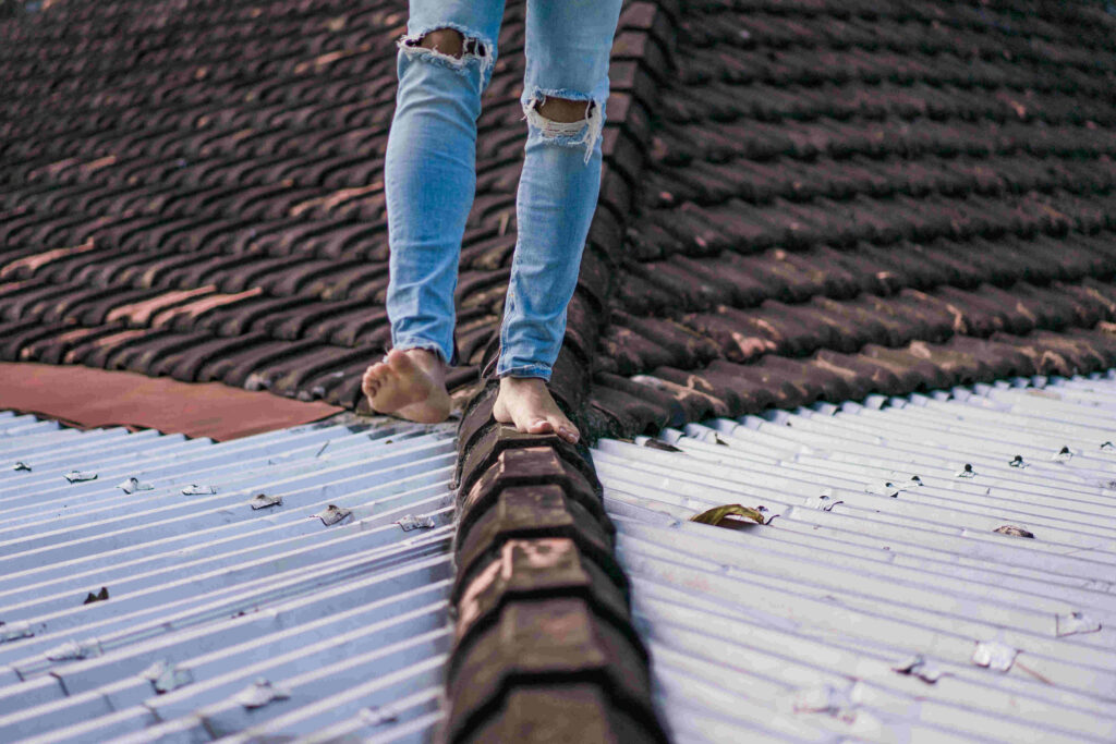 man-walking-roof-1-1024x683 Affordable Roofing Repair Moncure | Apex Roofing NC